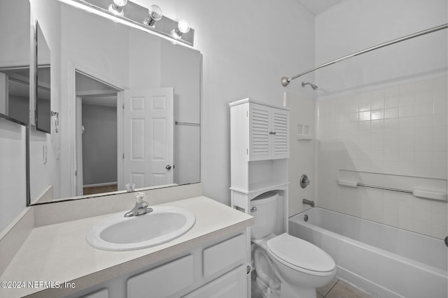 full bathroom with vanity, toilet, and tiled shower / bath