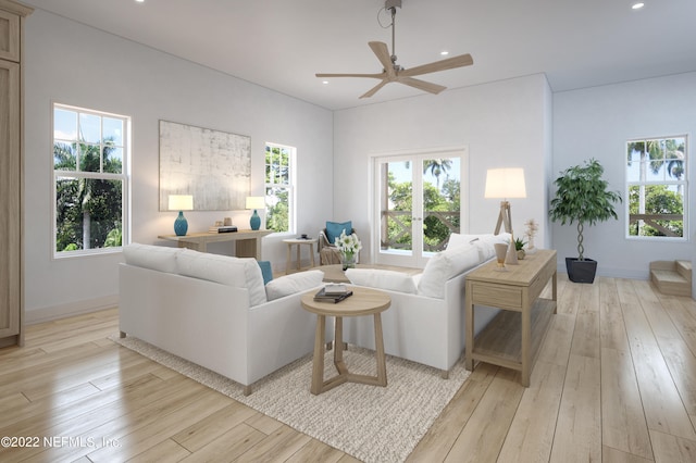 living room featuring ceiling fan and light wood-type flooring