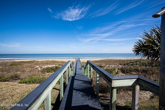 view of home's community with a view of the beach and a water view