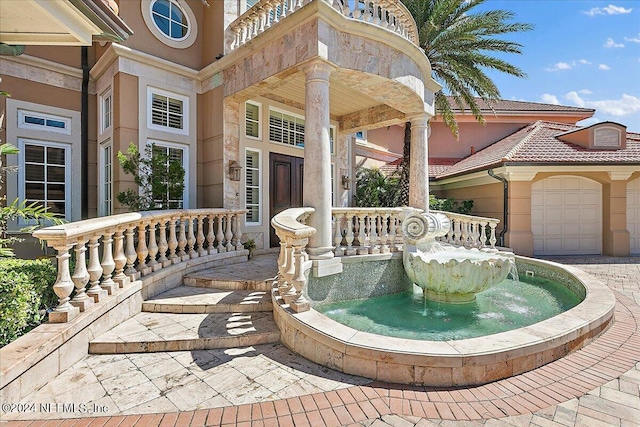 1201 Ponte Vedra Blvd, Ponte Vedra Beach, FL 32082 - exterior space featuring a garage, covered porch, and stone siding