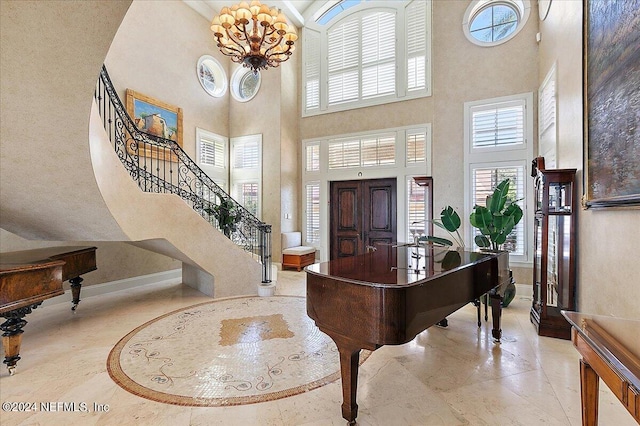 1201 Ponte Vedra Blvd, Ponte Vedra Beach, FL 32082 - entrance foyer featuring baseboards, a high ceiling, a wealth of natural light, and stairway