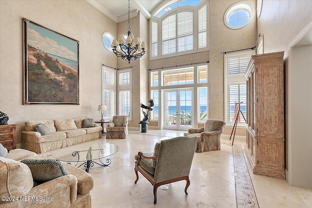 1201 Ponte Vedra Blvd, Ponte Vedra Beach, FL 32082 - living area featuring an inviting chandelier, crown molding, plenty of natural light, and a high ceiling