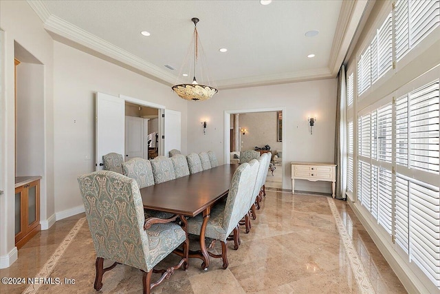 dining area featuring ornamental molding