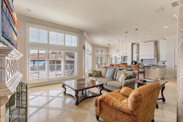 1201 Ponte Vedra Blvd, Ponte Vedra Beach, FL 32082 - living area with crown molding, recessed lighting, and visible vents