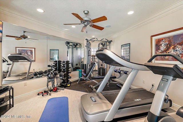 exercise area featuring ornamental molding, a textured ceiling, and ceiling fan