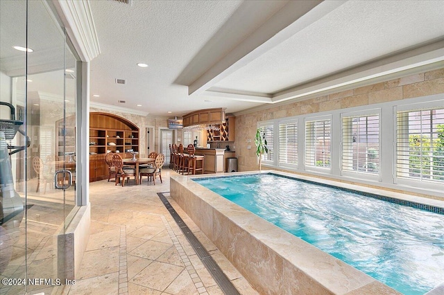 view of pool featuring a jacuzzi