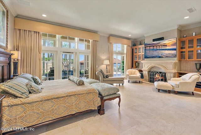1201 Ponte Vedra Blvd, Ponte Vedra Beach, FL 32082 - bedroom with crown molding, recessed lighting, a warm lit fireplace, and access to exterior