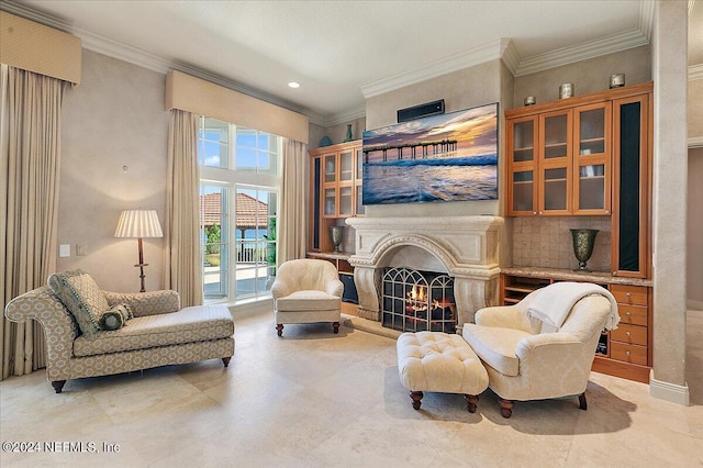1201 Ponte Vedra Blvd, Ponte Vedra Beach, FL 32082 - sitting room with recessed lighting, ornamental molding, and a warm lit fireplace