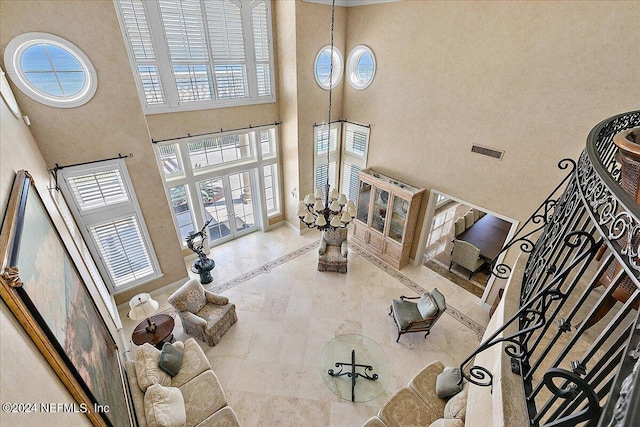 1201 Ponte Vedra Blvd, Ponte Vedra Beach, FL 32082 - living area with baseboards, visible vents, french doors, and a towering ceiling