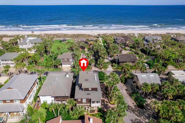 bird's eye view with a beach view and a water view