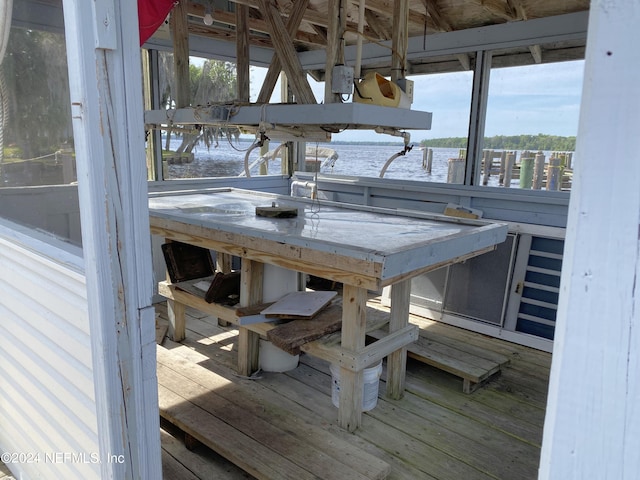 deck featuring a water view