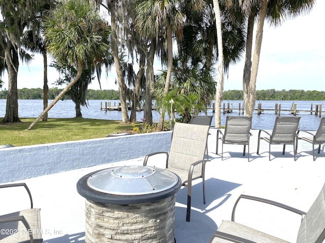 view of patio featuring a water view