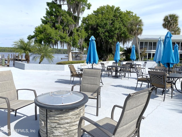 view of patio / terrace with a water view