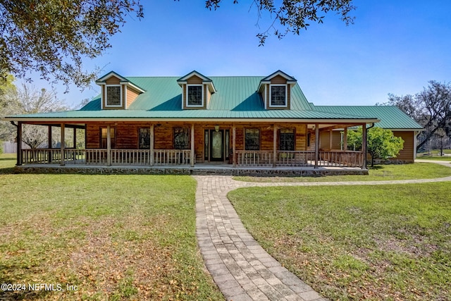 exterior space with a yard and a porch