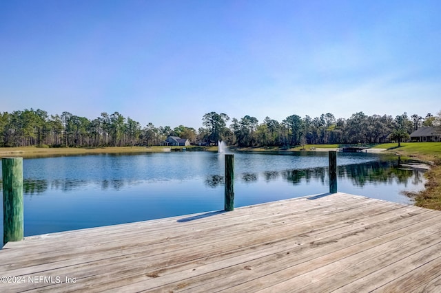 view of dock with a water view