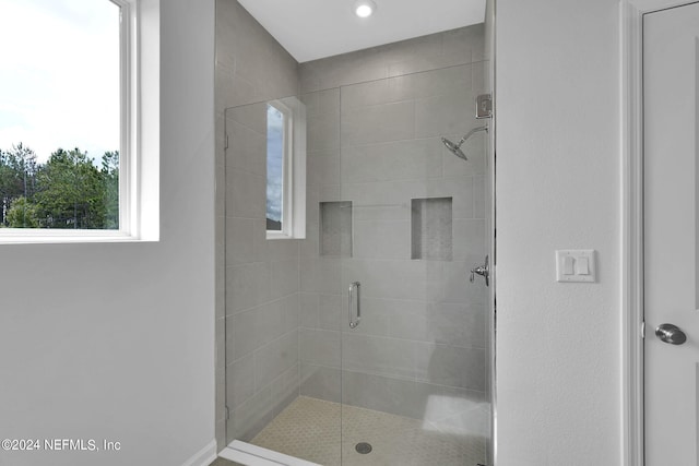 bathroom featuring walk in shower