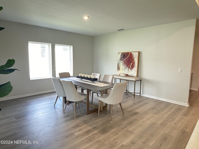 dining room featuring hardwood / wood-style floors