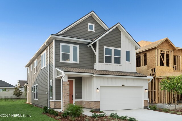 view of front of property featuring a garage