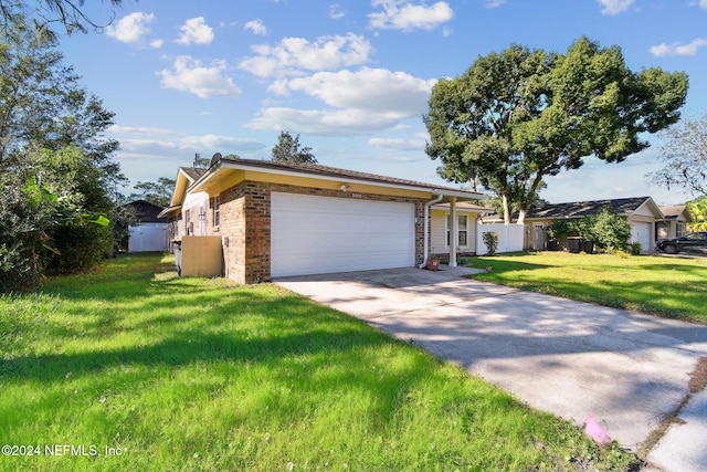 ranch-style home with a front lawn