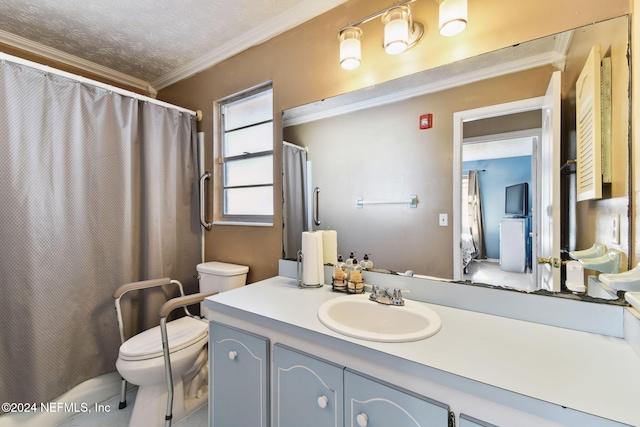 bathroom featuring toilet, vanity, a textured ceiling, and ornamental molding