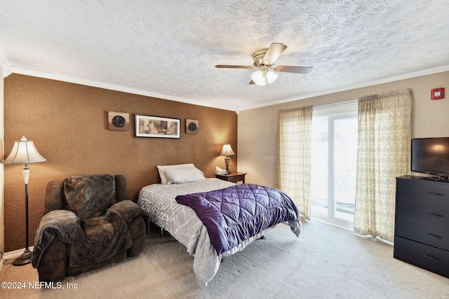 carpeted bedroom with access to exterior, ceiling fan, crown molding, and a textured ceiling