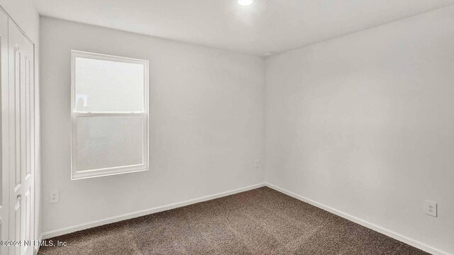 empty room featuring carpet