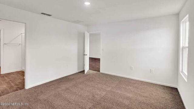 spare room with carpet floors