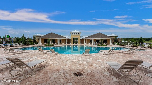 view of pool featuring a patio