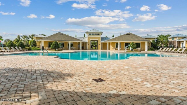 view of pool featuring a patio area