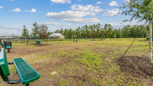 view of yard with a rural view