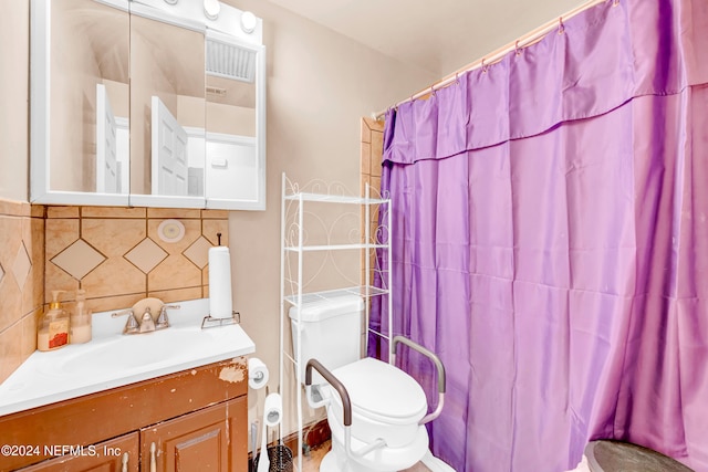 bathroom featuring vanity, a shower with curtain, backsplash, and toilet