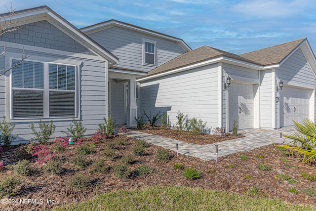 view of front of home featuring a garage