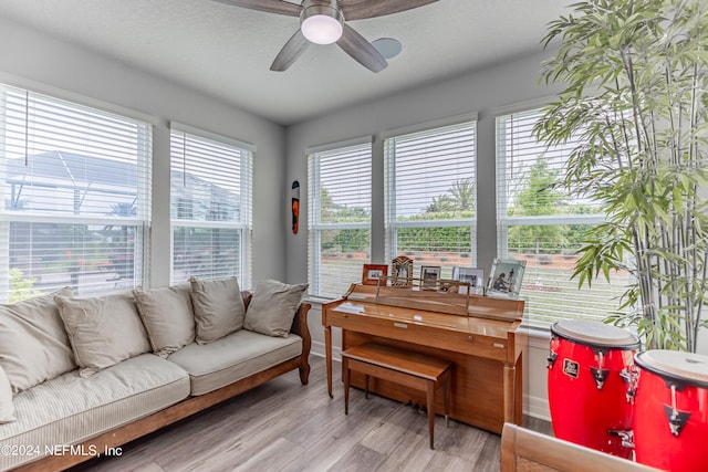 interior space with light hardwood / wood-style floors and ceiling fan