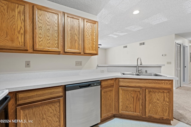 kitchen with light carpet, kitchen peninsula, a textured ceiling, sink, and dishwasher