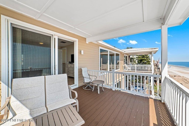 deck featuring a water view