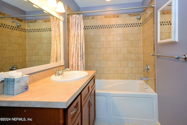 bathroom with large vanity and shower / bathtub combination with curtain