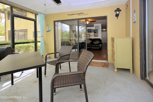 sunroom / solarium with ceiling fan