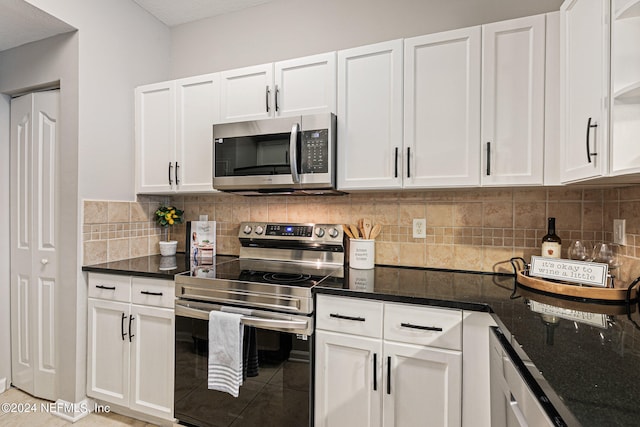 kitchen with white cabinetry and stainless steel appliances