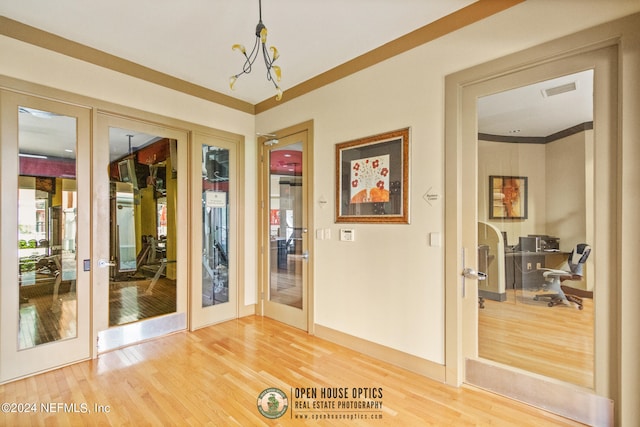 interior space featuring light hardwood / wood-style flooring and french doors