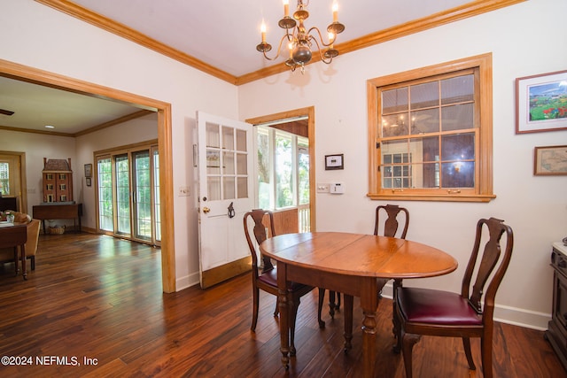 dining area featuring crown molding, dark hardwood / wood-style flooring, and a notable chandelier