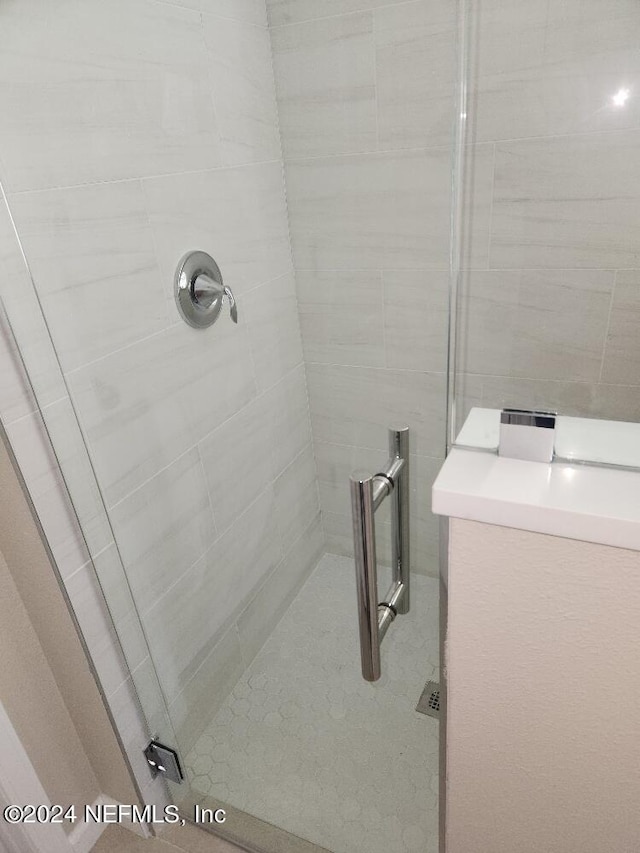 full bathroom with a shower stall