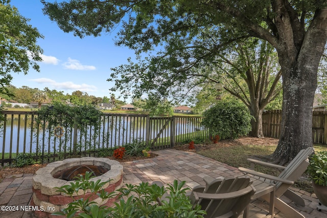 view of patio featuring a water view