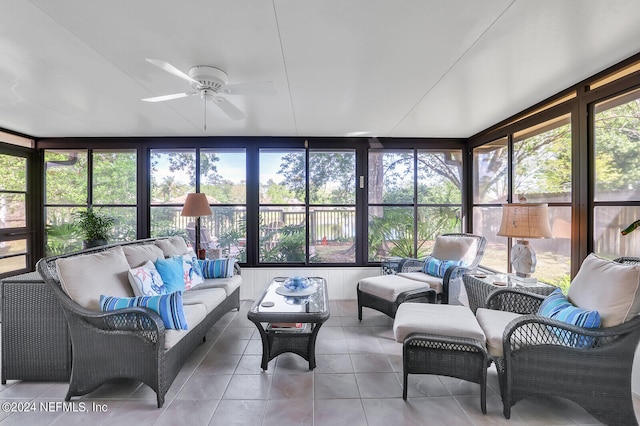 sunroom / solarium with ceiling fan