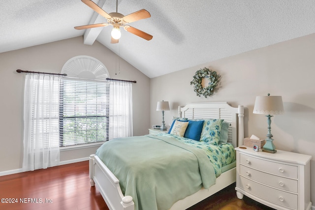 bedroom featuring vaulted ceiling with beams, a textured ceiling, ceiling fan, and dark wood-type flooring