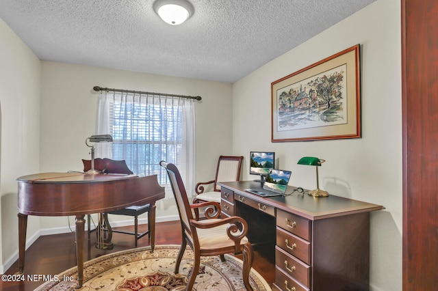 office space featuring a textured ceiling and hardwood / wood-style flooring