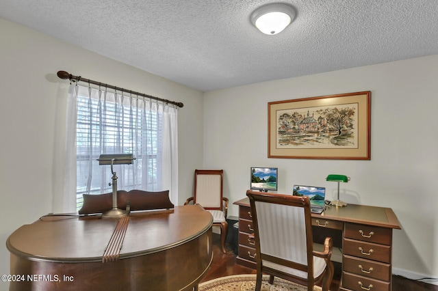 office space featuring a textured ceiling