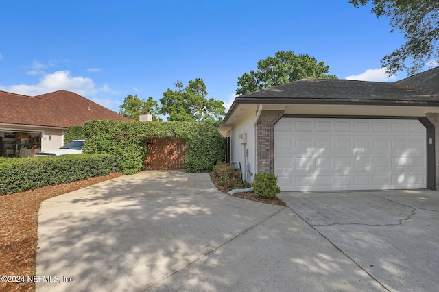 view of home's exterior with a garage