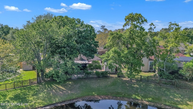 birds eye view of property featuring a water view