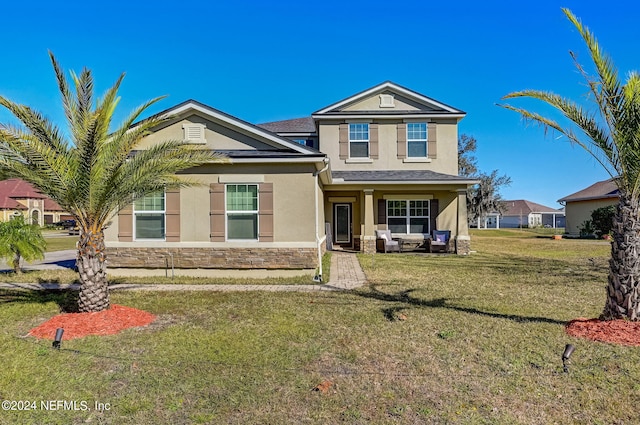 view of front of property with a front yard