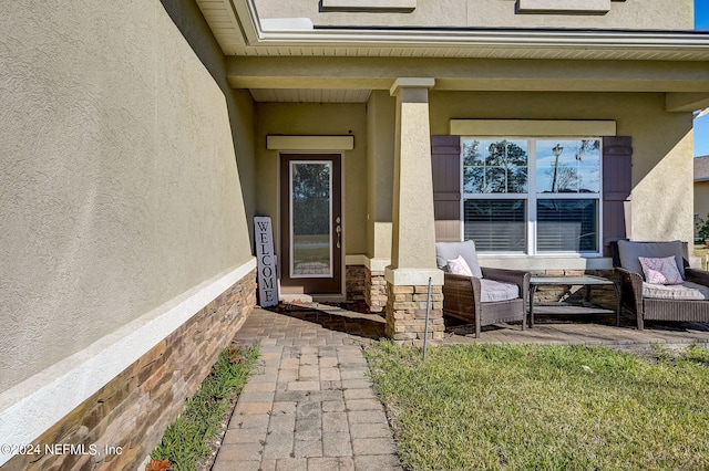 entrance to property with a porch